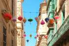 Valetta, Malta. Typical architecture. Chinese lanterns hang from above, Art Print